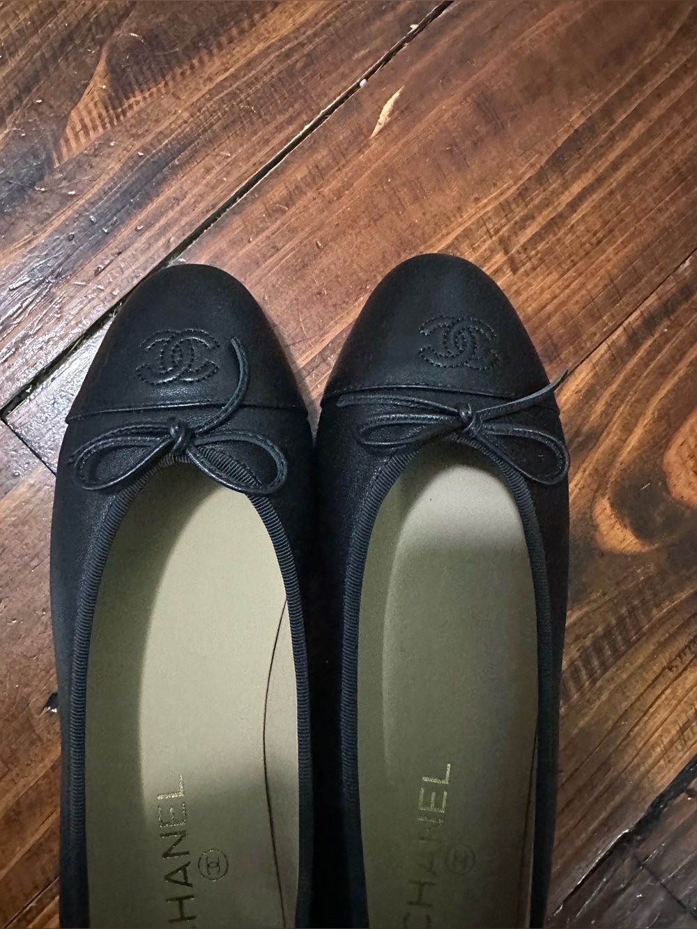 CHANEL Black Ballet Flats with CC Logo and Bow